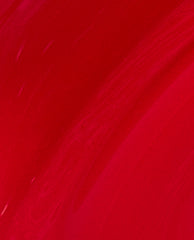 Glossy brushstroke swatch of OPI Big Apple Red nail lacquer showing rich, vibrant classic red color, ideal for holiday manicures or an OPI nail polish gift set product detail closeup.