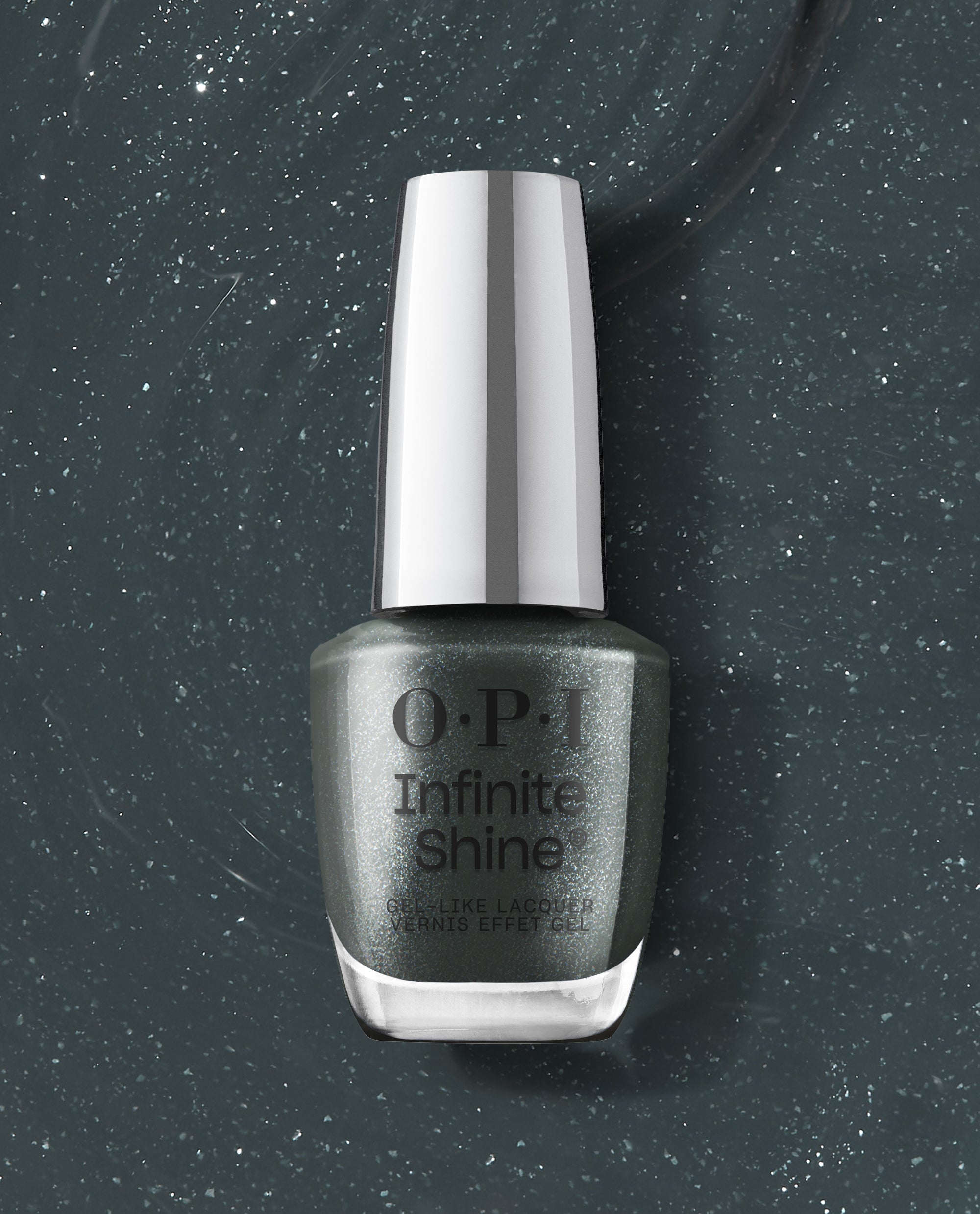 OPI nail polish Infinite Shine Get in Platform-ation bottle standing upright, showcasing a deep slate-gray gel-like lacquer packed with fine silver shimmer against a matching sparkling polish smear background.