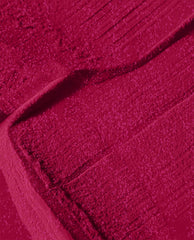 OPI It’s All Greek to Me dipping powder swatch shows a rich fuchsia-pink shade with fine sparkle and velvety texture, a bold option for fall nail colors.
