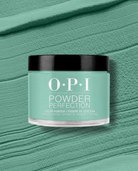 OPI Rated Pea-G Powder Perfection dipping powder jar centered on a textured mint/pea-green backdrop, showcasing a fresh green nail polish shade ideal for spring nail colors, perfect for long-lasting OPI dip manicures.