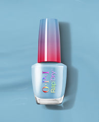 OPI Snap Your Fingers RapiDry nail polish bottle standing upright, featuring pale blue polish and a tall red-to-silver gradient cap, centered on a smooth light blue background, ideal close-up for an OPI nail polish gift set product page.
