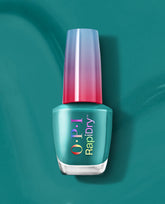 OPI What a Winterful World RapiDry nail polish bottle with teal lacquer and an iridescent pink-to-purple cap standing upright against a glossy teal background, ideal product shot for an OPI nail polish gift set.