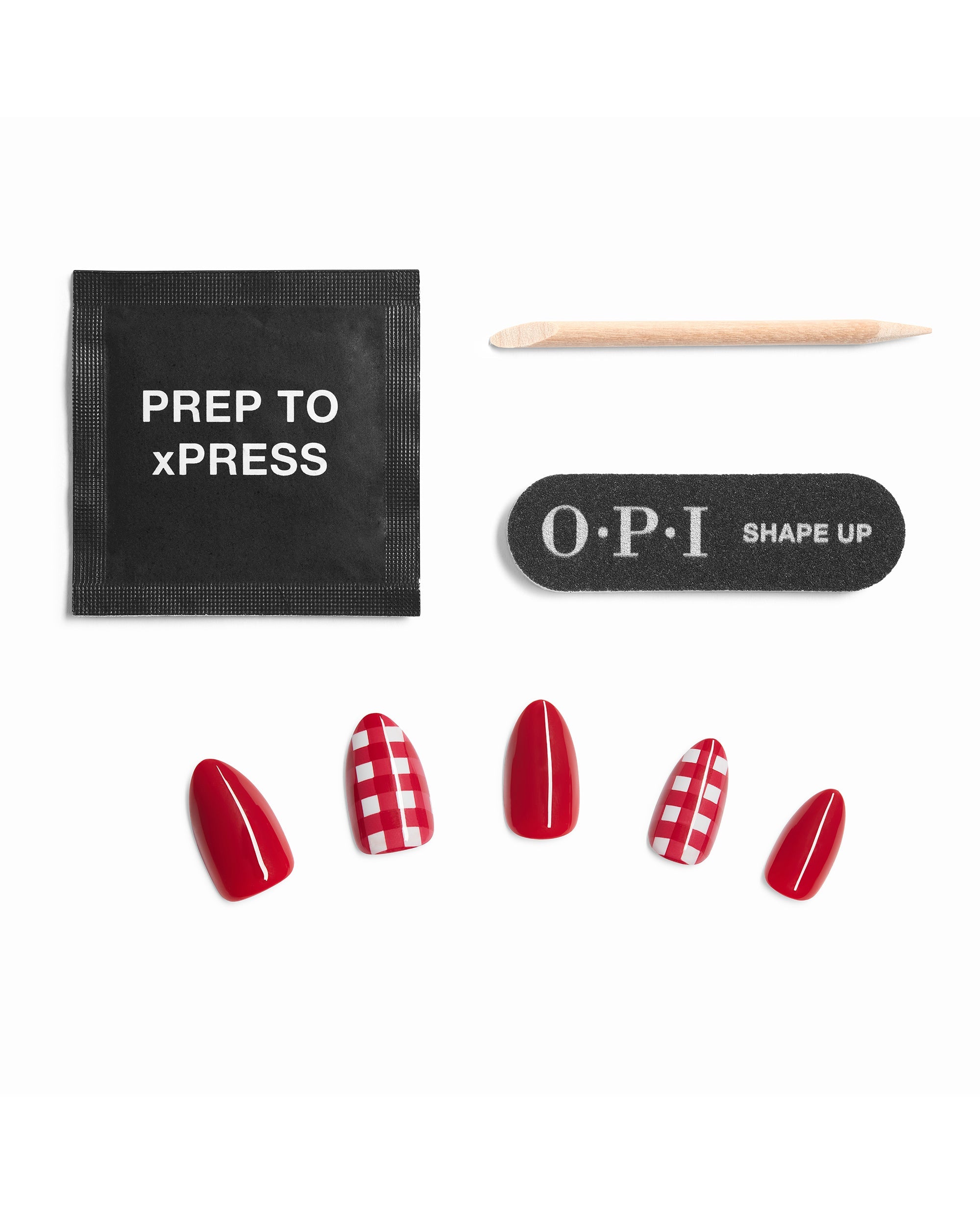 OPI Big Apple Pie Sticking Point press-on nails display glossy red and red-white gingham designs with prep pad, wooden cuticle stick, and Shape Up nail file on a white background.