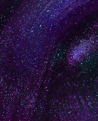 Abstract After Dark nail lacquer brush swatch showing a deep midnight purple OPI nail polish with fine blue, pink, and silver glitter flecks creating a galaxy-like shimmer across the glossy surface.