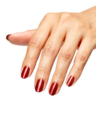 Hand with neatly manicured oval nails coated in OPI nail polish shade CD Rom-antic, a glossy metallic red nail lacquer, held against a clean white background to showcase the rich color and smooth, even coverage.