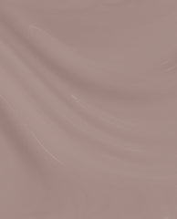 Crimp and Proper nail lacquer swatch showing a glossy, smooth mauve-pink OPI nail polish shade with subtle light reflections across a flowing liquid surface, ideal for a neutral everyday manicure in the US market.