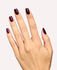 Hand modeling OPI Every Month is Oktoberfest gel nail polish, a glossy deep plum-burgundy shimmer shade on short square nails against a clean white background, ideal for fall nail colors.