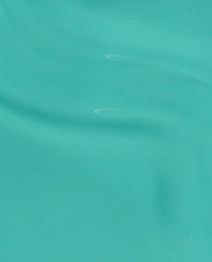 OPI I’m Yacht Leaving gel nail polish brush swatch spreading smoothly with subtle ripples, a glossy teal-green finish that highlights vibrant green nail polish and trending spring nail colors for US shoppers.