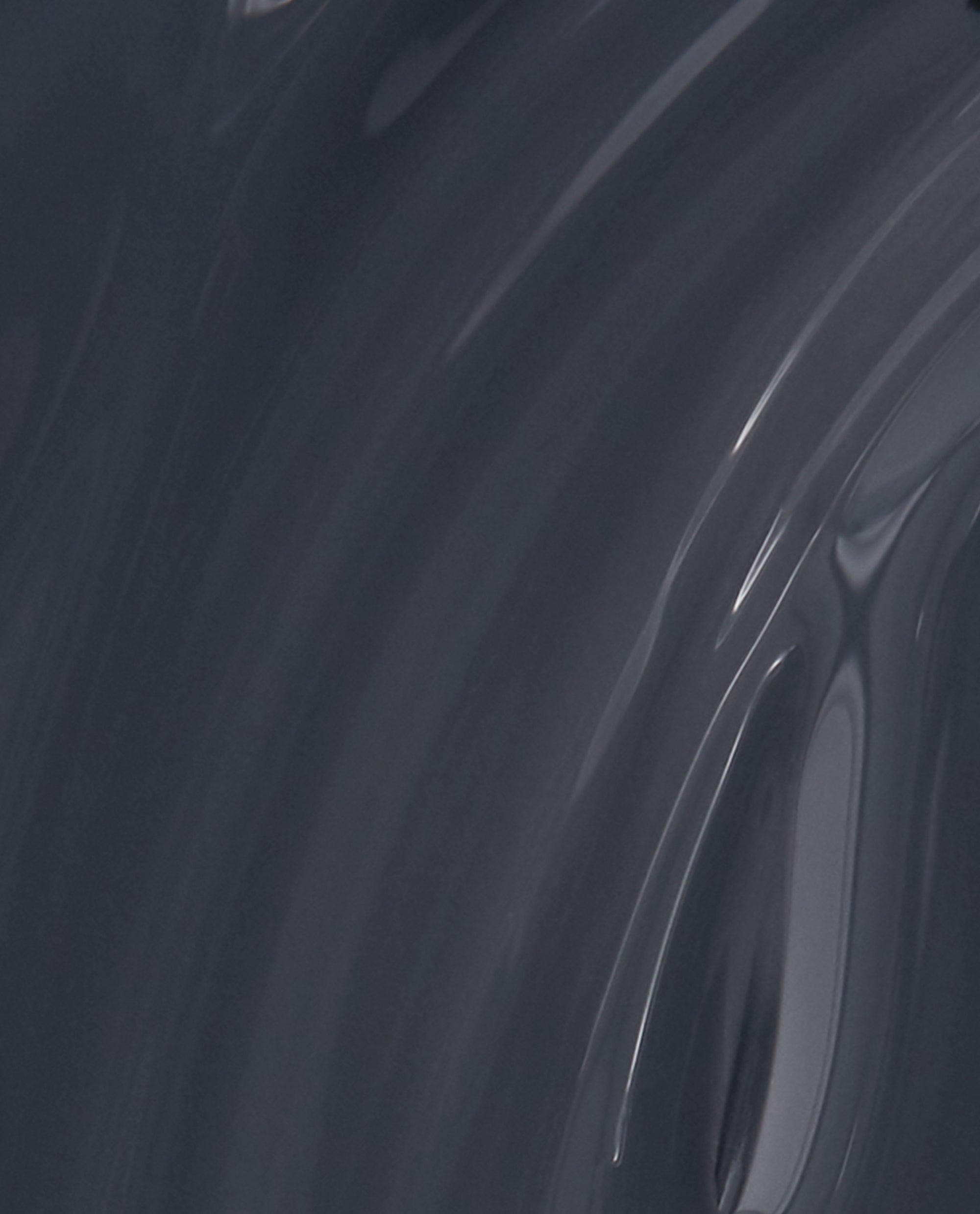 Rub-a-Pub-Pub OPI nail polish nail lacquer swatch showing a smooth, glossy deep charcoal gray shade with subtle blue undertones in a close-up, curved brushstroke texture on a solid background.