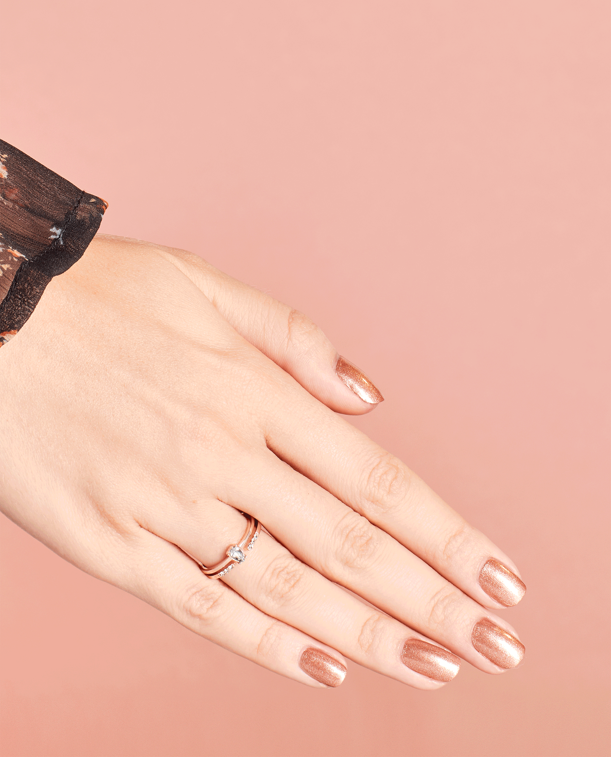OPI Worth a Pretty Penne Rose Gold Nail Polish GIF